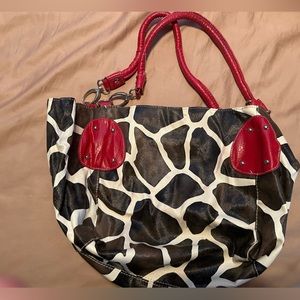 Giraffe print bueno purse trimmed in red